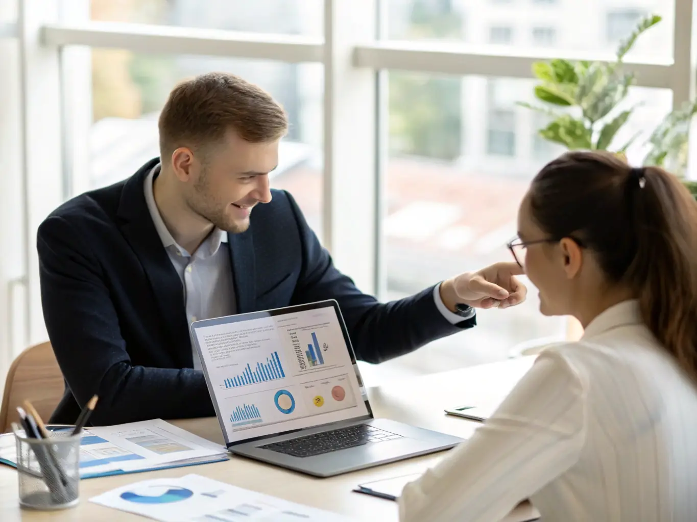 A business coach in a modern office setting, working with a client on strategic planning, using visual aids like charts and graphs to illustrate growth opportunities.